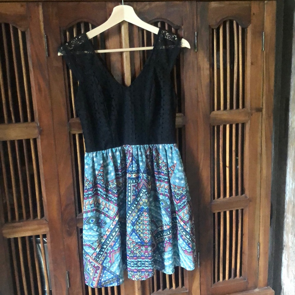 Mini black dress with patterns